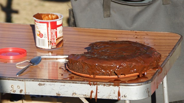 When camping...bake a cake!  Dutch oven cooking can be so versatile.  Figure out a favorite from home and put it to the test in the great outdoors!