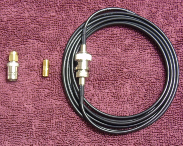 Ed Fong adapters that come with the antenna to include a 6' extension.