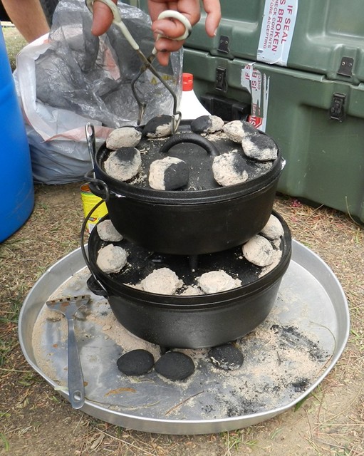Stacked 12&quot; (Lodge) and 10&quot; (Camp Chef) DO.  I have no qualms with either/or.  Both solid DOs.  The pan is a re-purposed water heater pan.