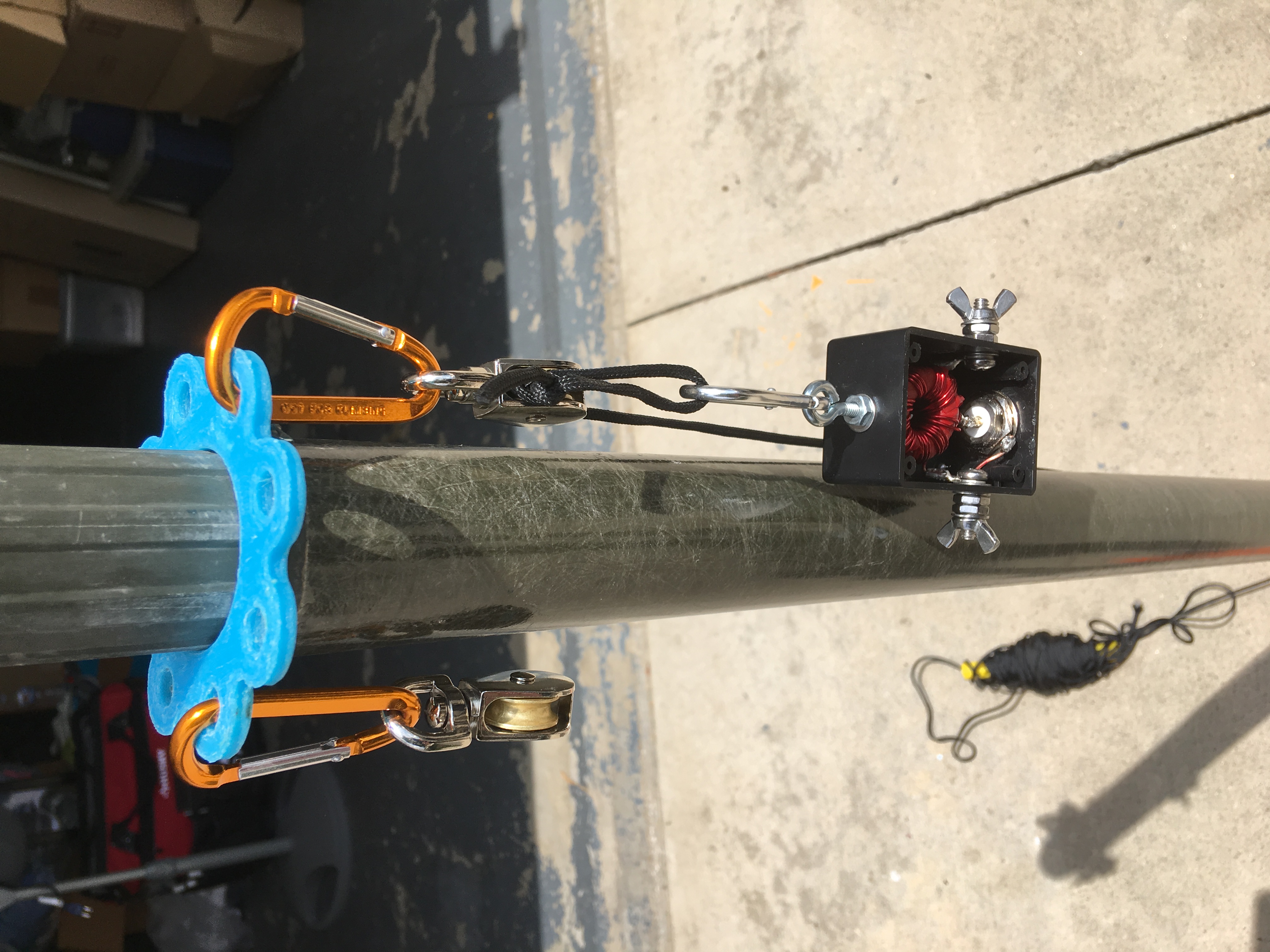 Antenna mast guy system with pulleys for up to three antennas.