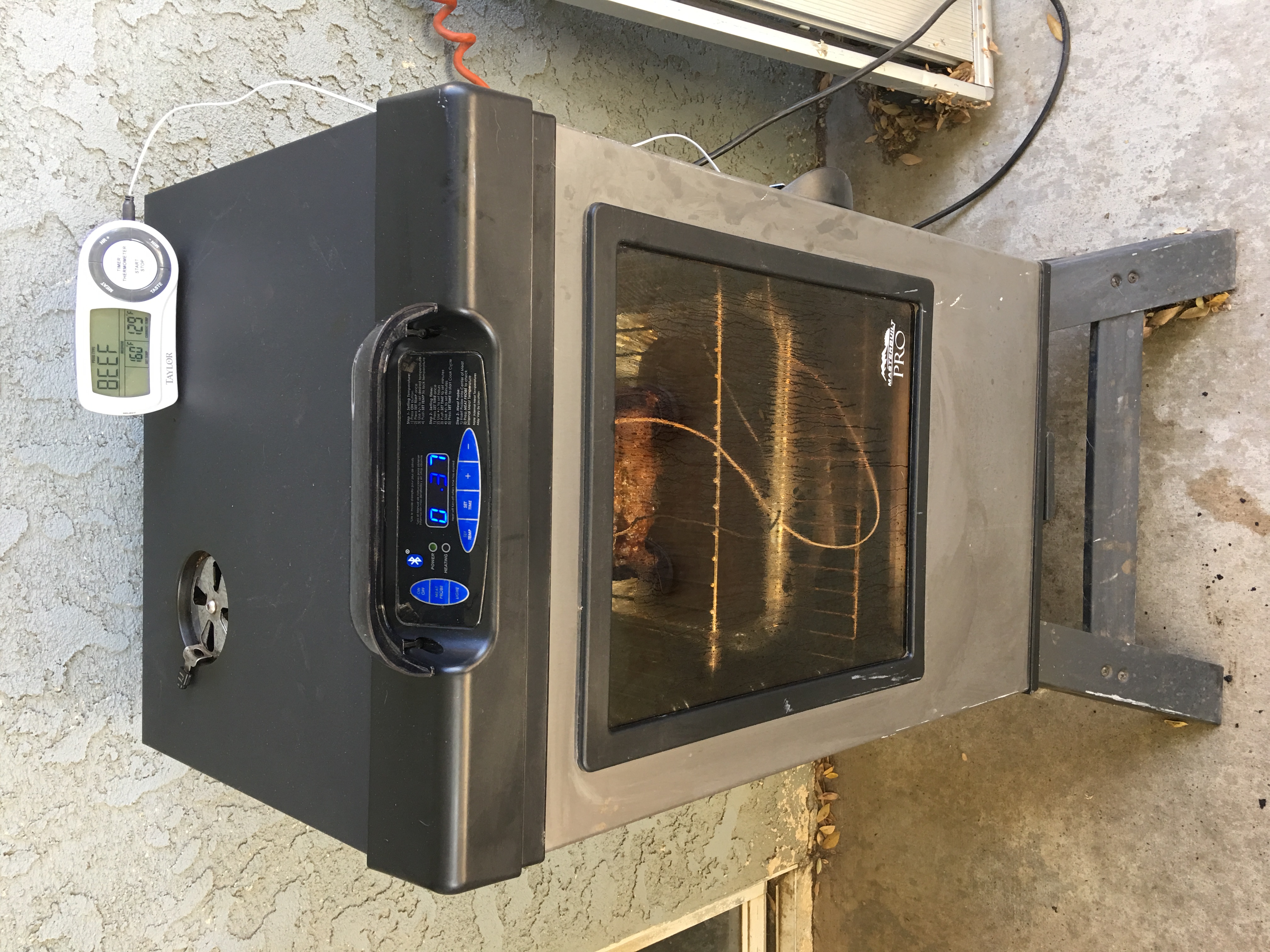 My wife purchased this for me last Christmas. I like the electric smokers because once you set the temperature, you don't have to constantly monitor what is going on. Just add chips once in a while. I would highly recommend the Bluetooth option.