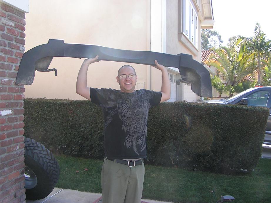 My son Kyle showing how lite the original bumper was...