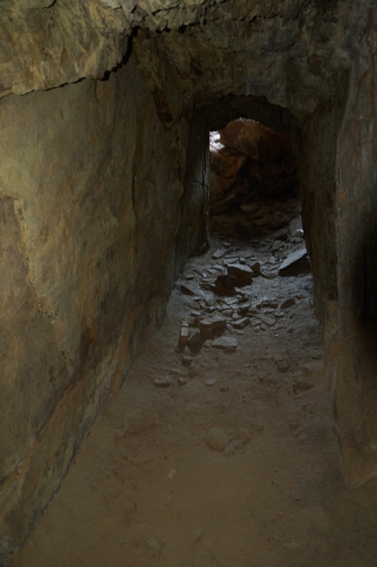 Hard rock mining can be mind blowing. I was trying to breakdown cement at the base of a fence post today and I gave up pretty quick. I can't imagine how much effort was involved in this short "hallway" looking mine passage.