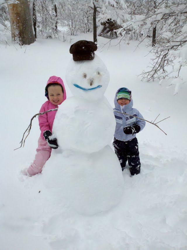 A couple of my nieces and their first snowman