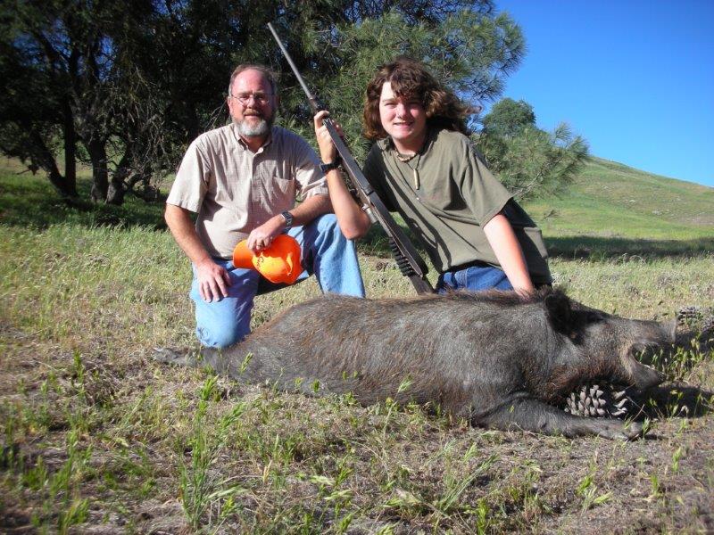 N - Boar hunt. A youth hunters first big game. The fruits of the hunt are excellent pork.